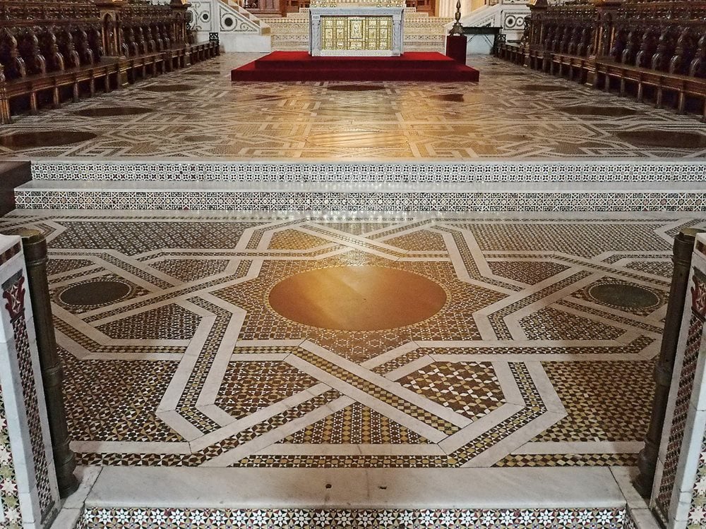 <strong>Below right</strong> Near the sanctuary in the cathedral of Monreale, a marble balustrade shows a pattern that is purely Islamic, and mosaics both on its lower register and on the cathedral&rsquo;s floor, <strong>above</strong>, show influences from Islamic, Byzantine and Roman designs.&nbsp;