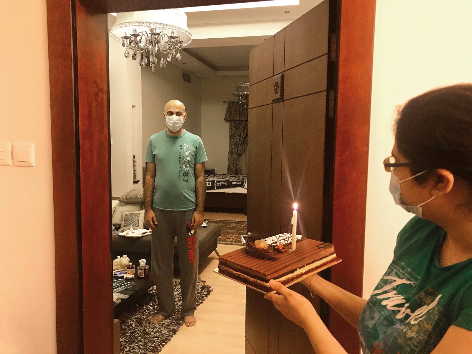 This picture shows him inside his room at our family home. My mother, who is carrying the cake, and my brother and grandmother and I surprised him. We accepted that the family reunion was without hugs and kisses, but it is enough that he is with us now.