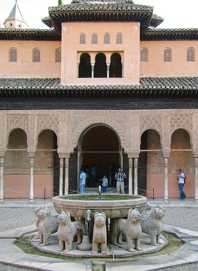 Built in the 13th and 14th centuries as the palace-fortress complex of the Nasrid rulers of Granada, Spain, the Alhambra was declared a World Heritage Site in 1984. Together with the Great Mosque of Córdoba and the Giralda tower of Seville, it is among Spain’s most outstanding examples of Muslim architecture. Inside the Alhambra, the Courtyard of the Lions