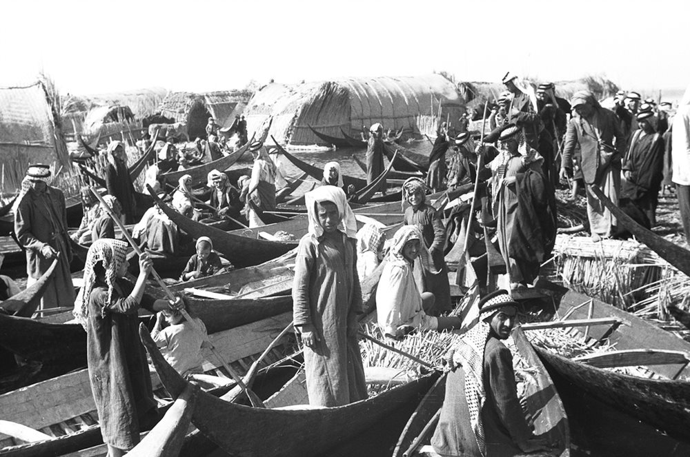 Thesiger noted that this photo was made while attending a wedding in the marshes in 1953. Thesiger’s main activity in many villages, however, was providing medical care. 