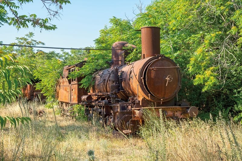 <b>Above and below: </b>At the now-abandoned Rayak train yard, about 17 kilometers from the Syrian border, Carlos Naffah, president of Train/Train Lebanon, shows how one of the railway&rsquo;s manual turntables allowed an engine to be switched to another track or turned around. The non-profit organization hopes to revive segments of the Beirut-Damascus line as part of its larger plan for the country&rsquo;s rail transport and freight future. For now, some 22 locomotives remain in the yard. For decades the Rayak station was also a transfer point for connections on the line north to Baalbek and beyond, into northern Syria, Anatolia and, from there, to Europe.