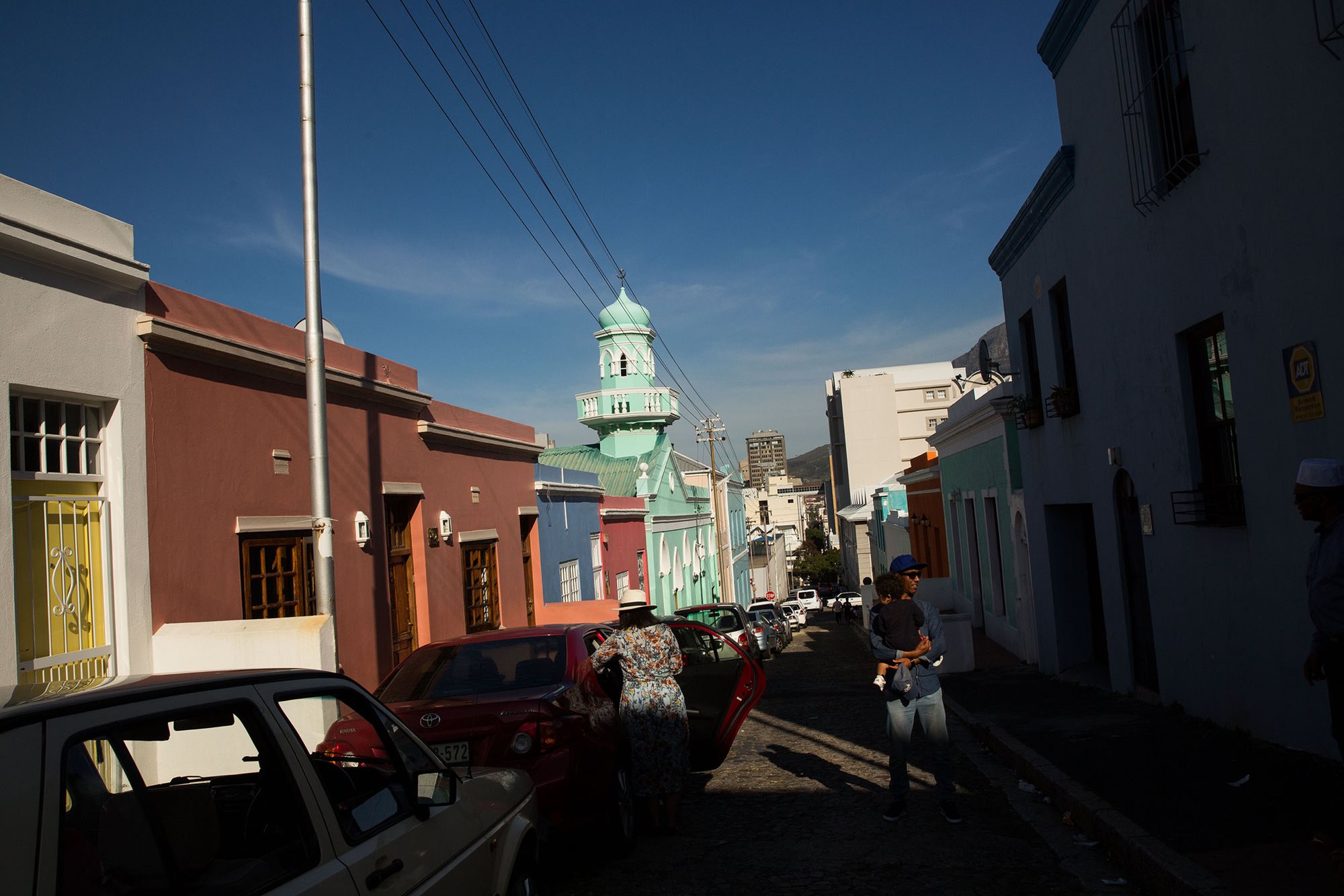 A local landmark and one of many historical buildings in Bo-Kaap, the minaret of the Masjid Boorhaanol Islam rises amid the neighborhood&#39;s colorful walls on Longmarket Street. Local leaders, including Minister of Arts and Culture Nathi Mthethwa, are beginning the process of designating Bo-Kaap as a <span class="smallcaps">unesco</span> World Heritage Site.