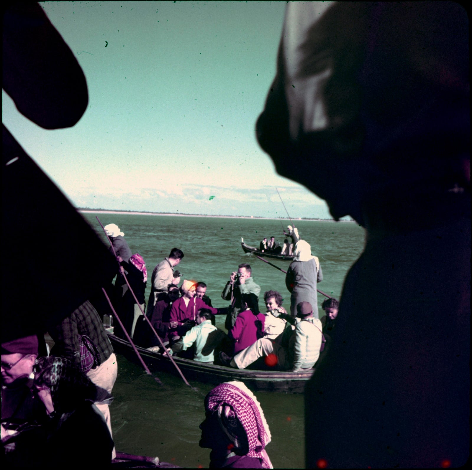 Mary Elizabeth took her photos with a
twin-lens Rolliflex camera, and most
of the five dozen images in the box
show scenes such as this wintertime
weekend excursion of expatriate employees
along the east coast of Saudi
Arabia. While she is remembered at
the library for her meticulous expansion
of its collections in both English
and Arabic, her carefully composed
photos remained largely uncaptioned
and undated.