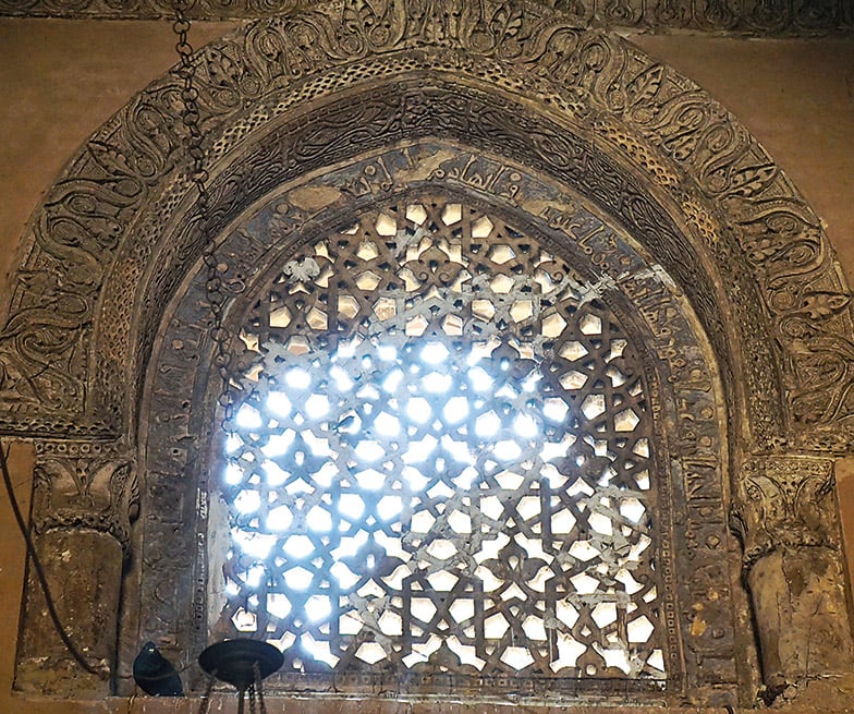 This pierced stone screen at the mosque of Ibn Tulun, Cairo, produced in the ninth century CE, sets a biomorphic, leaf design at the center of each 12-pointed star. 