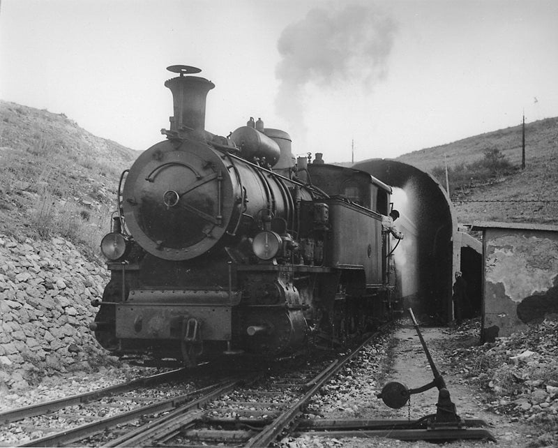 <b>Above and below:</b> Built in the 1940s, several cement tunnels, like the one depicted here, helped shield the tracks from snow acculumation.