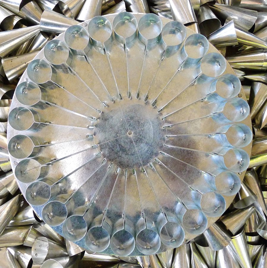 <p>Bakers often use the patterns as signatures. A large <em>bosma</em> (&ldquo;press&rdquo;) bread stamp, <em>above</em>, uses a Tashkent-style pattern. <em>Below</em>: More assorted instruments for bakers.</p>
