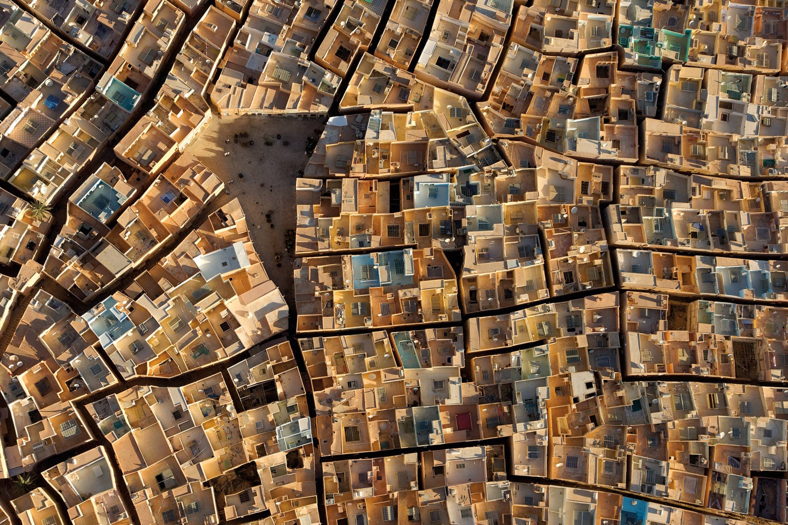 The day before this image was taken, Steinmetz flew up to get a view of the town using the foot-launched, motorized paraglider—at less than 45 kilograms, the lightest motorized aircraft in the world—that allowed him to make uniquely close, low-altitude aerial photographs in remote regions. The next morning at sunrise, he made multiple flyovers above Beni Isguen, bracing the camera between his legs in order to look straight down to the pattern and colors of the village’s walled, rooftop patios and narrow streets. “There are still parts of the world that live on, in a traditional way,” Steinmetz reflects. “It’s important to know there are other worlds out there.” 