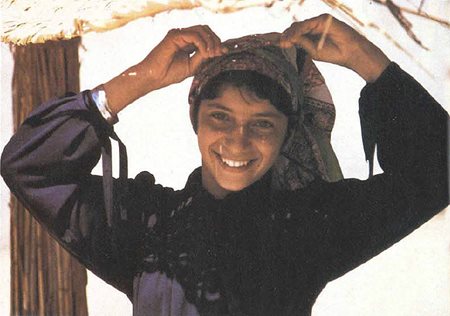 A girl's smile reflects the happiness of a people used to the simplicity of age-old ways.